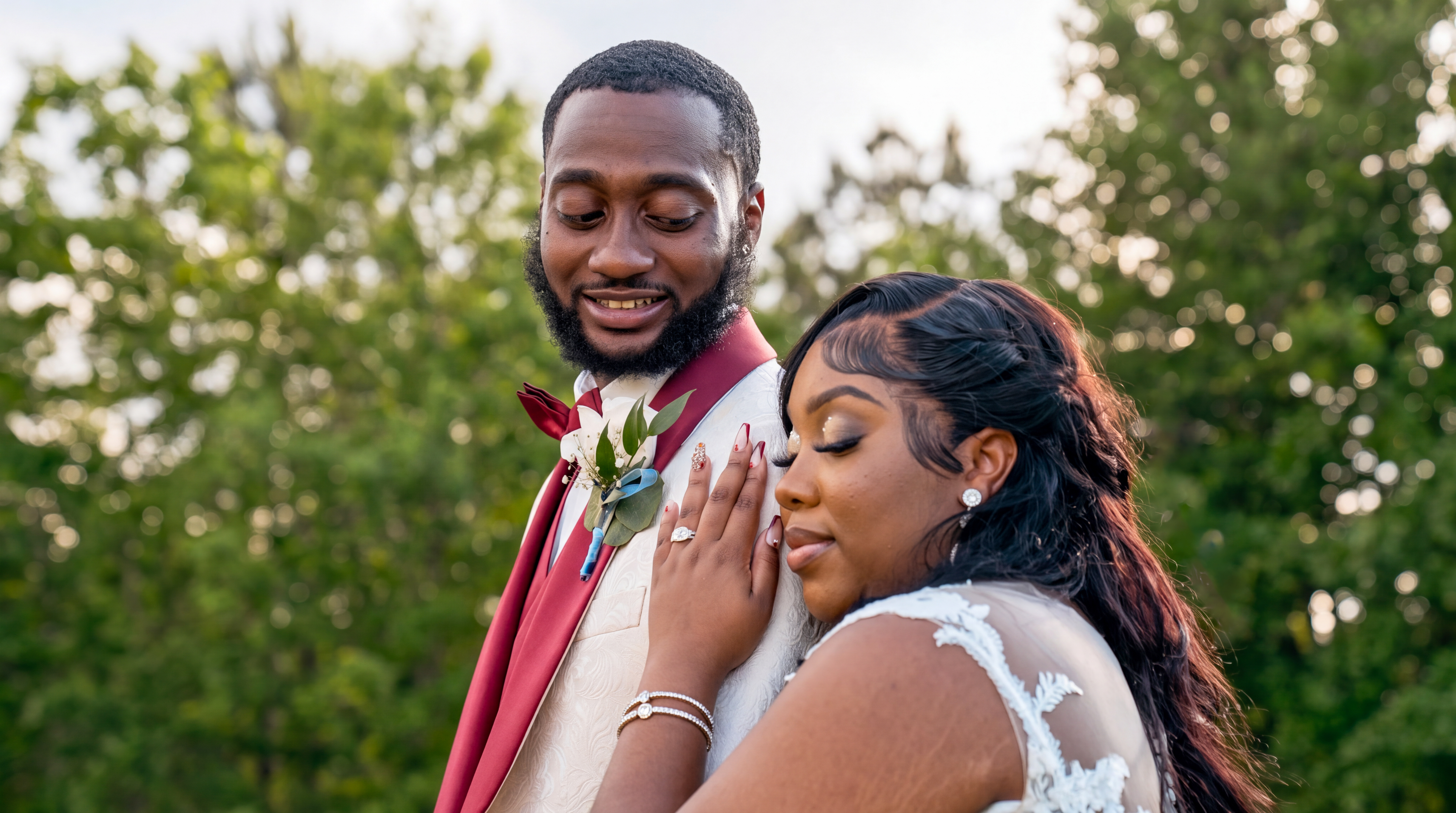 Newlywed couple sharing a quiet outdoor portrait together